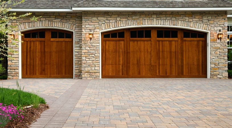 Brick Driveway in Macomb County with garage Doors